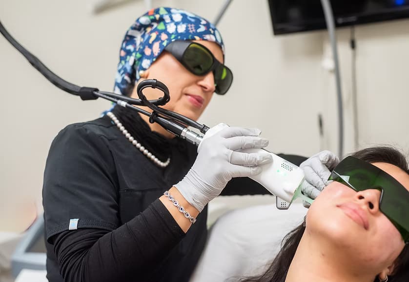 Nahida treating a patient at Diamond Laser Center
